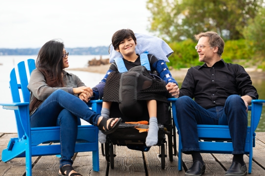 Parents_With_Son_at_Lake_(2).jpg